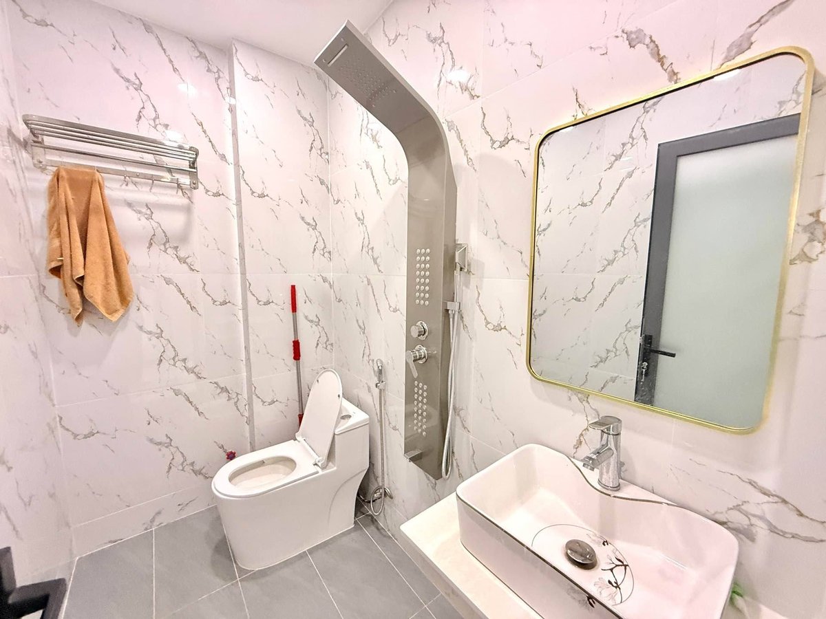 hà mặt tiền 3 lầu 4 phòng ngủ full nội thất - Quận 12